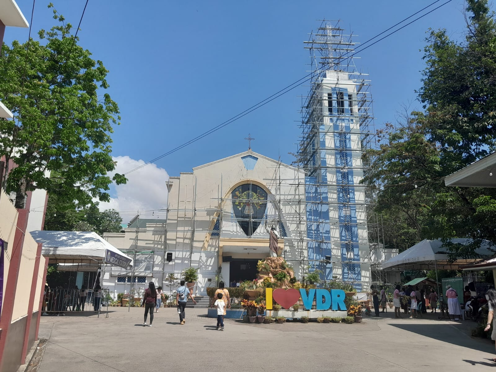 The Nuestra Señora de Regla Parish. The features at the front consist of a stained glass window depicting the "Santo Niño" with the bellfry standing at the right. When I took a picture, there were scaffolding surrounding the bellfry. Probably part of renovation efforts.