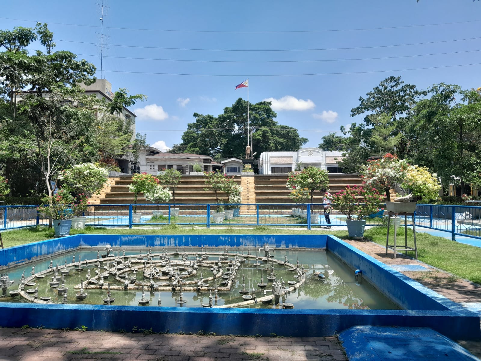 Plaza Rizal. They said it's a good place to visit at night with the fountain lighting up and dancing in various forms. The narra tree can be found at the center back of the plaza. The center front consists of Jose Rizal's statue. All in all, I like the uniqueness of their plaza.