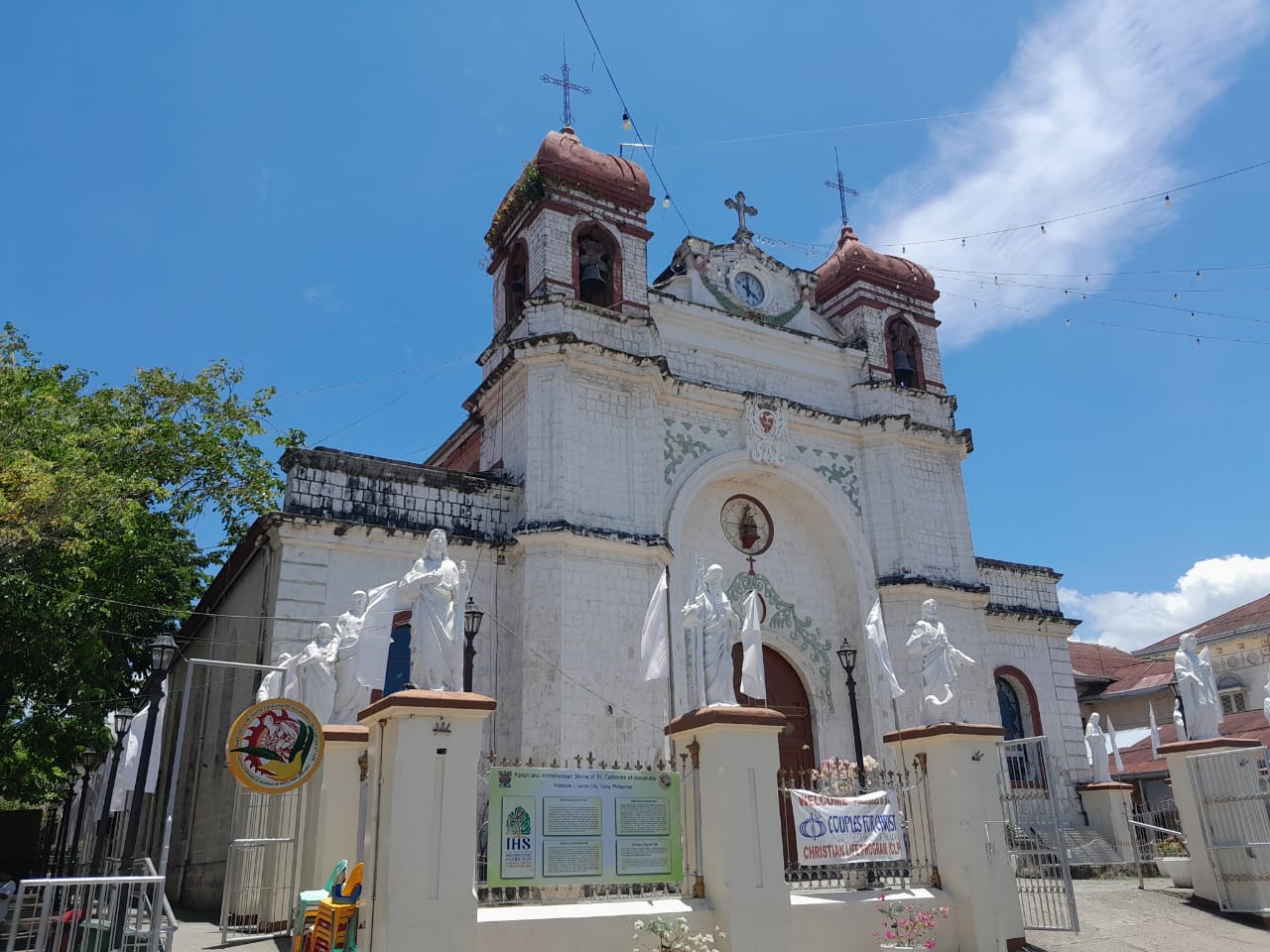 The Archdiocesan Shrine of St. Catherine of Alexandria. Two bell towers can be seen at the front with a clock positioned at the center. The front gates were closed when I arrived so I entered the church via the side gates. The interior was, like all churches, as grand as ever, with white and gold paintings embellished in the altar..